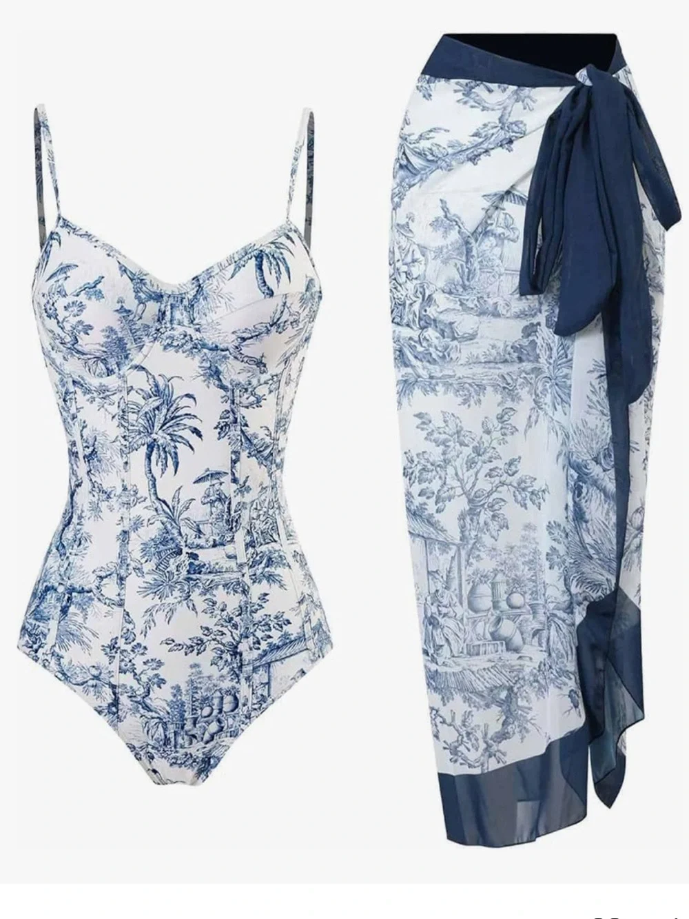 White and navy onepiece swimsuits with matching coverup.